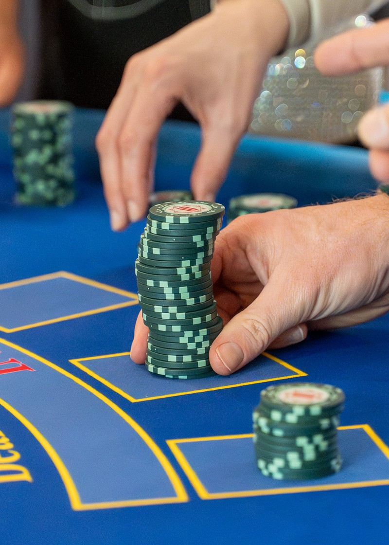 Corporate casino hire: guests playing blackjack at a London company event