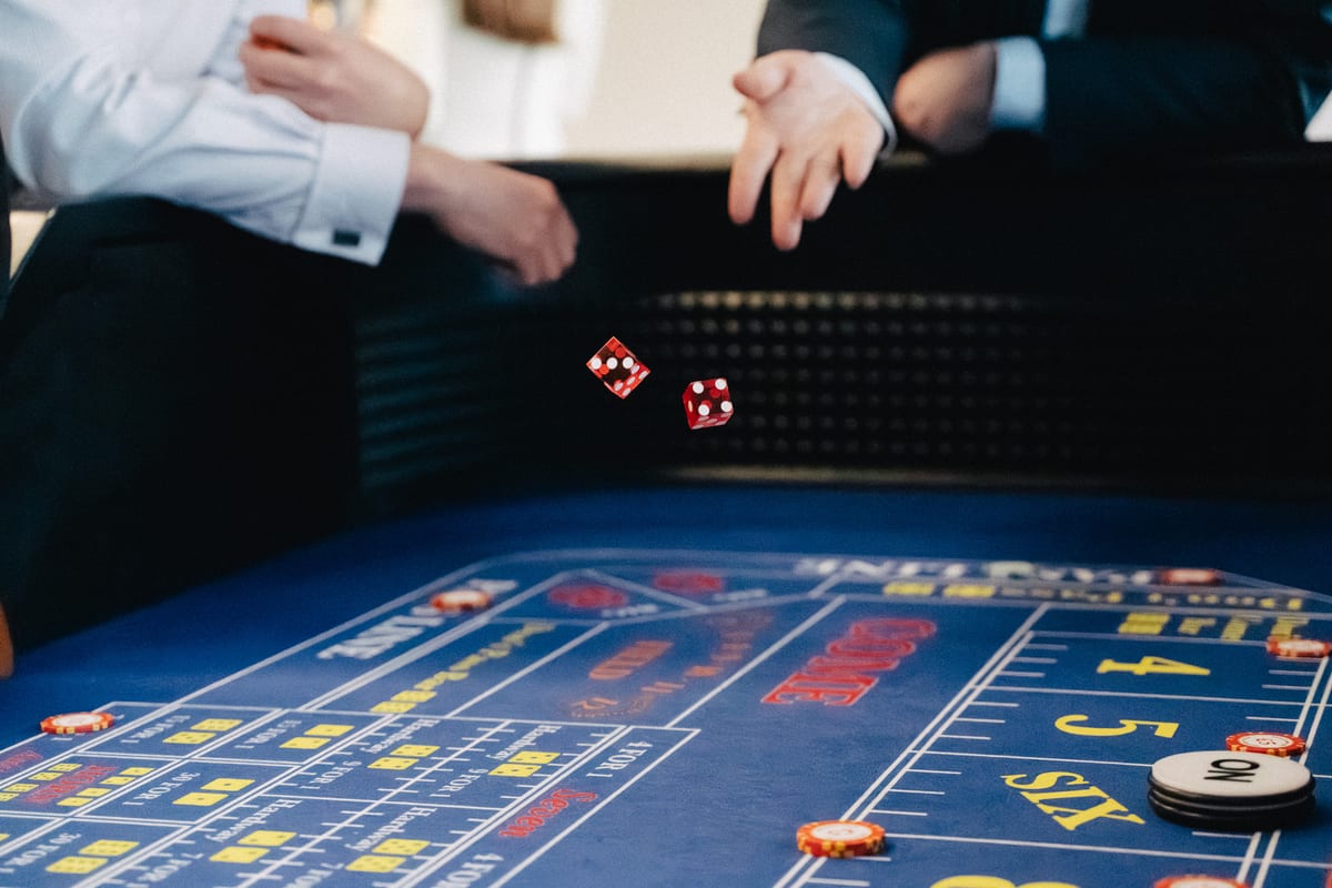 Dice thrown across the craps table