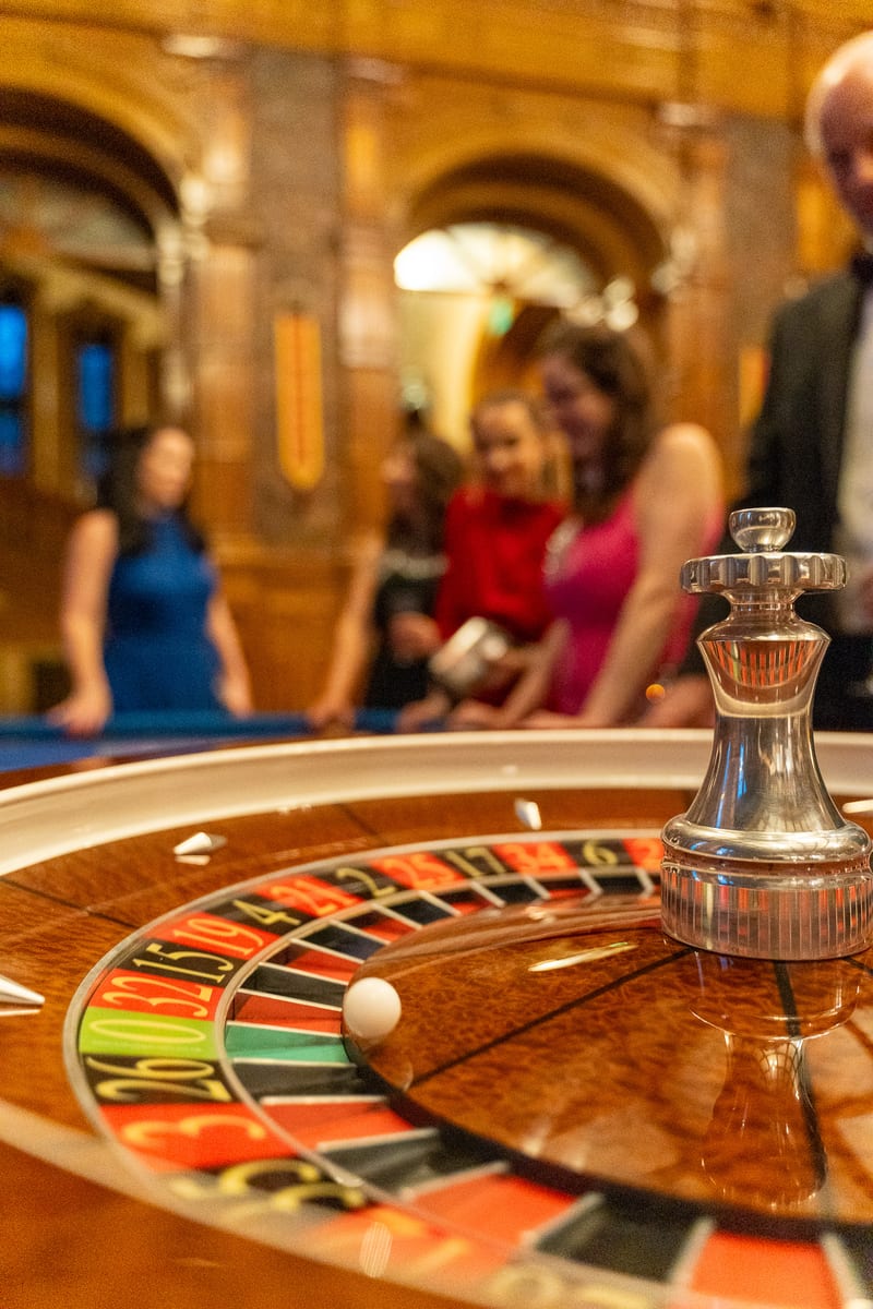 The ball settles on the wheel as guests wait on the result