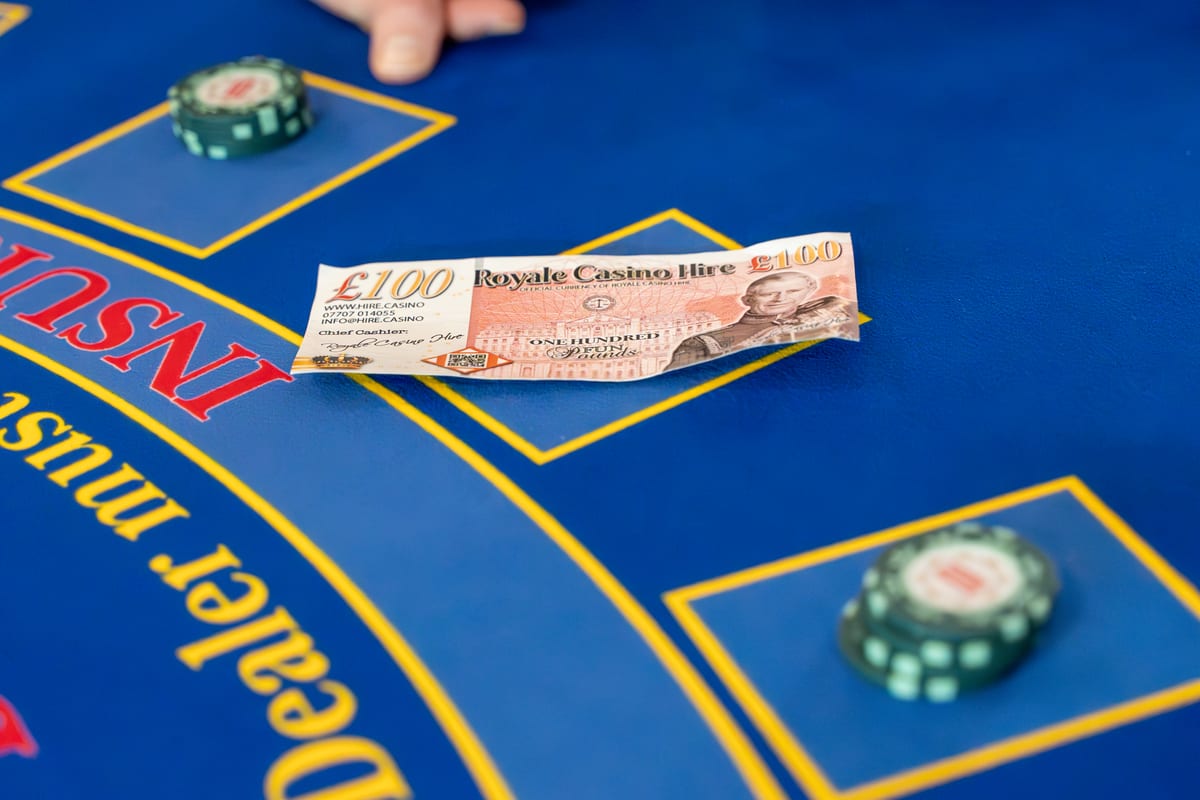 A Royale fun money note on the blackjack layout